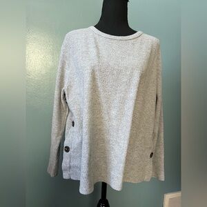 Grey crew neck sweater with buttons on side